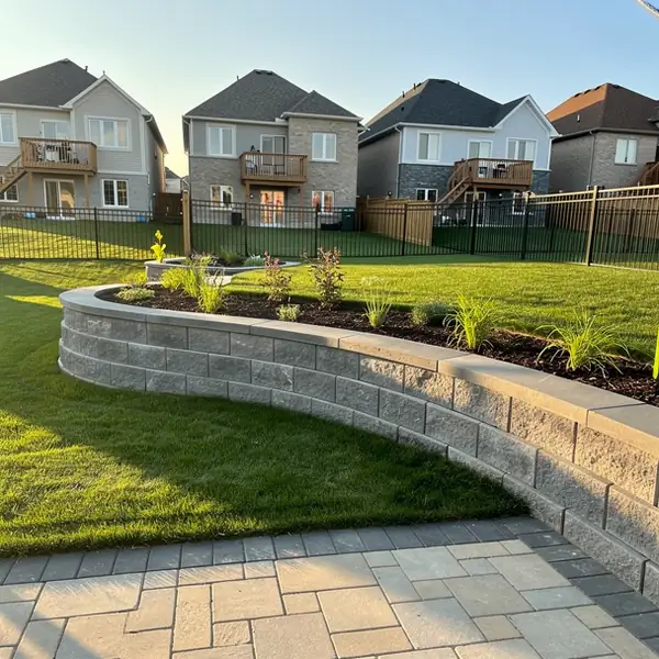 Completed segmental block wall in Milton yard