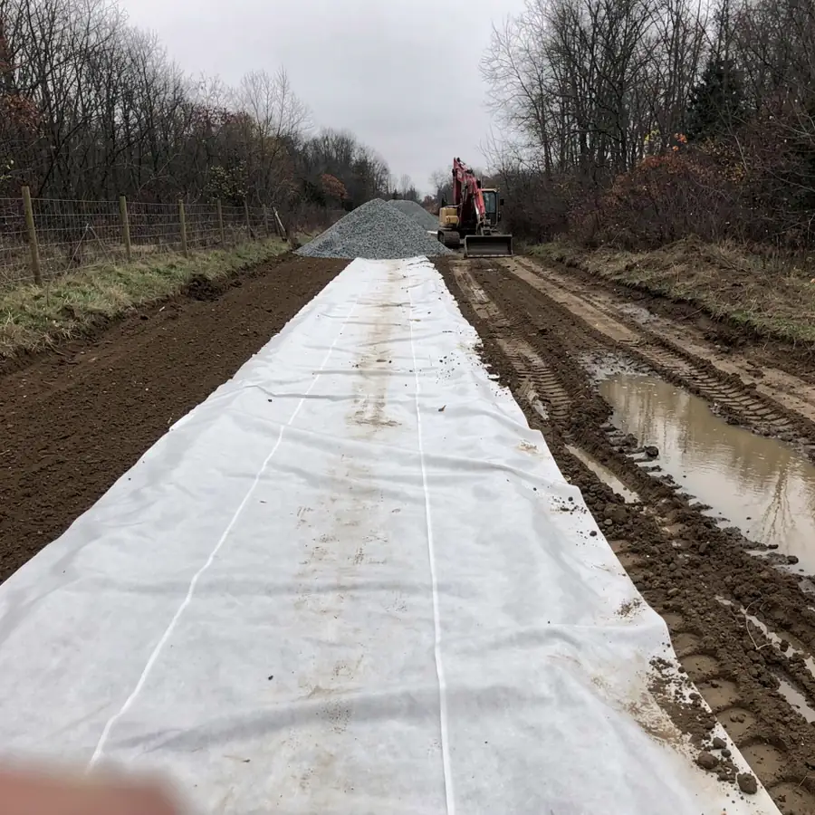 Geotextile fabric on clay subgrade for road