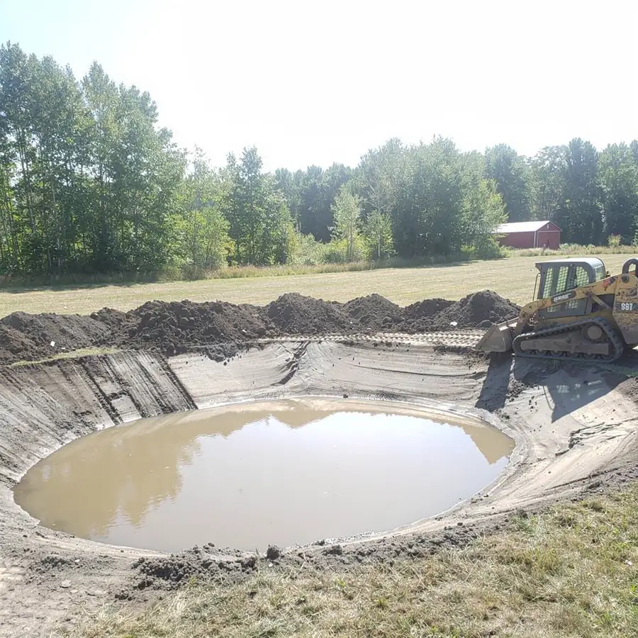 Newly dug farm pond in Puslinch field